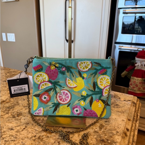 America & Beyond Citrus Blueberry Infusion Clutch - Picture 2 of 9